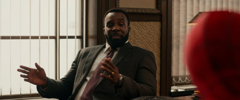 Sadie Sink Is Jean Grey — And The Brand New Day Trailer Just Made It Impossible To Deny 2 Tramell Tillman As William Metzger Of Damage Control Faces Spider-Man Across A Desk In Spider-Man: Brand New Day