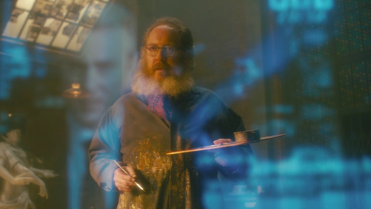 Ultron In Marvel Comics: Origin, Versions And Secret Wars 2 Ultron'S Bearded Human Avatar In Front Of A Glowing Blue Interface In Visionquest