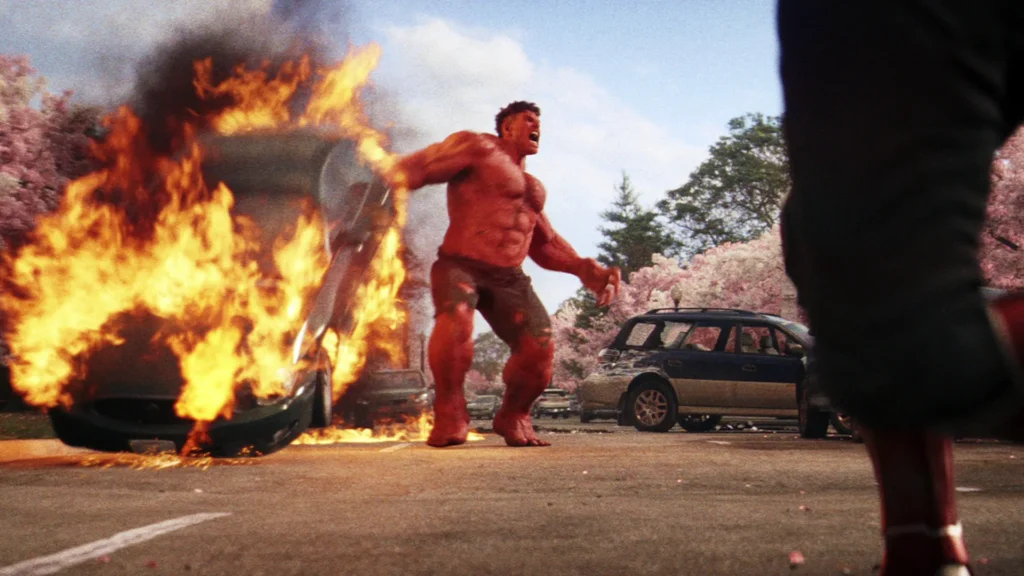 red hulk fighting with car fire