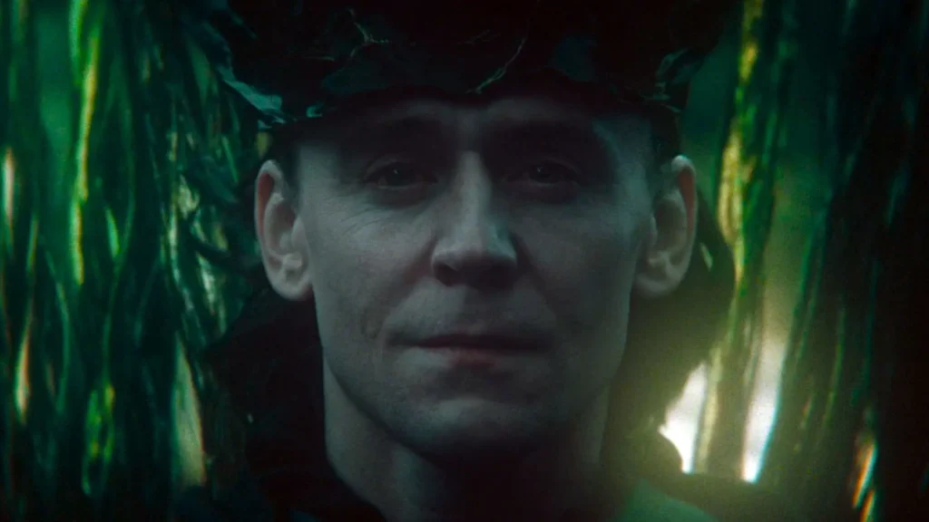 Loki as God of Stories holding multiverse branches in Yggdrasil formation from Loki Season 2