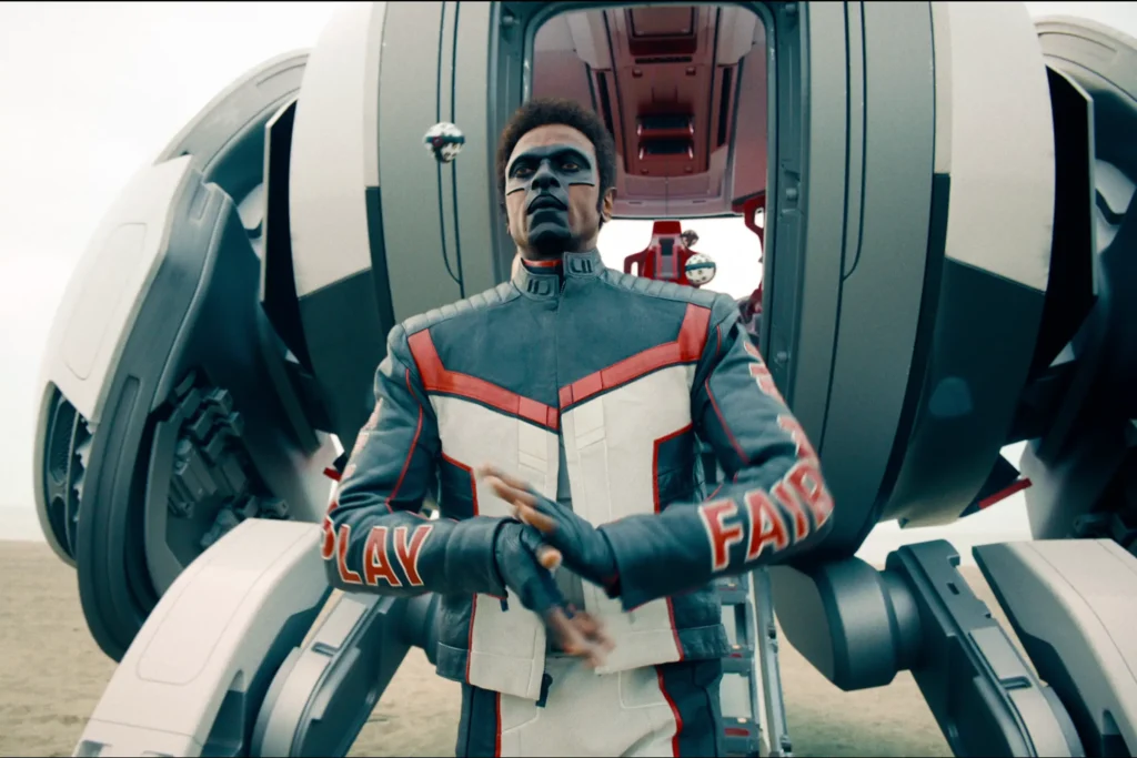 Mr. Terrific In His Signature Fair Play Suit Sitting In Advanced Vehicle Cockpit In James Gunn'S Superman Movie