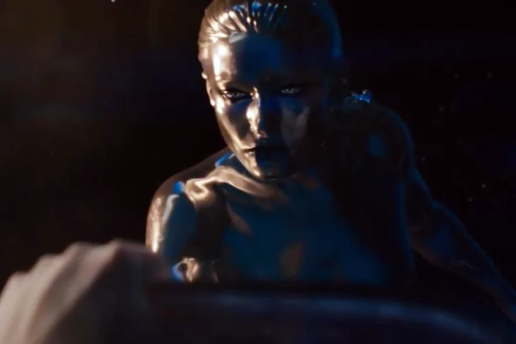 The Silver Surfer In Motion During An Action Sequence, Displaying His Cosmic Powers With Dramatic Lighting Effects