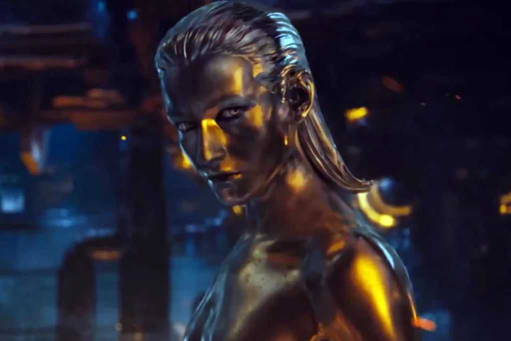 Profile View Of The Silver Surfer With Atmospheric Golden Lighting Highlighting His Metallic Features And Cosmic Nature