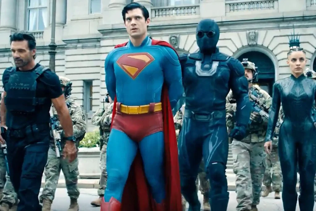 Superman In Traditional Red And Blue Costume Captured By Military Personnel And Government Officials Outside Federal Building