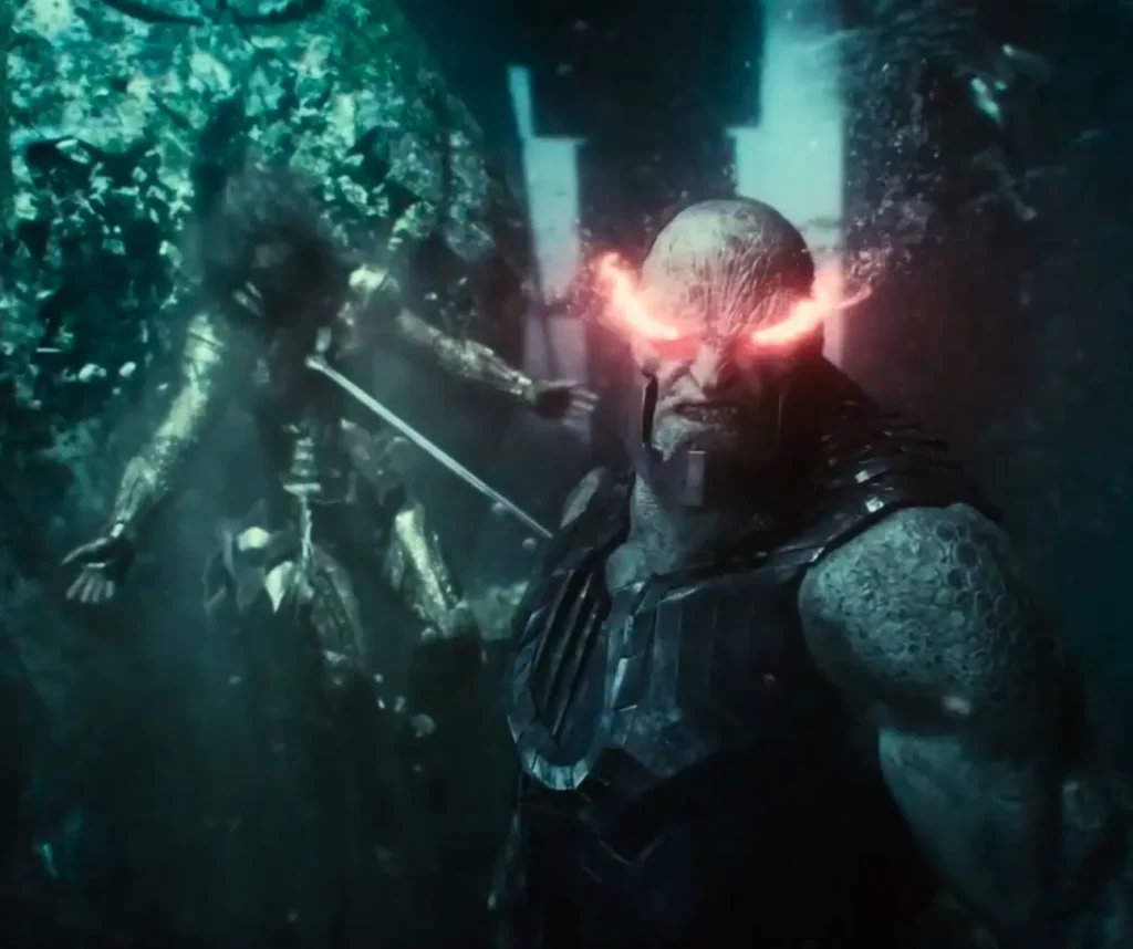 Darkseid firing red Omega Beams from his eyes at opponent during intense battle scene