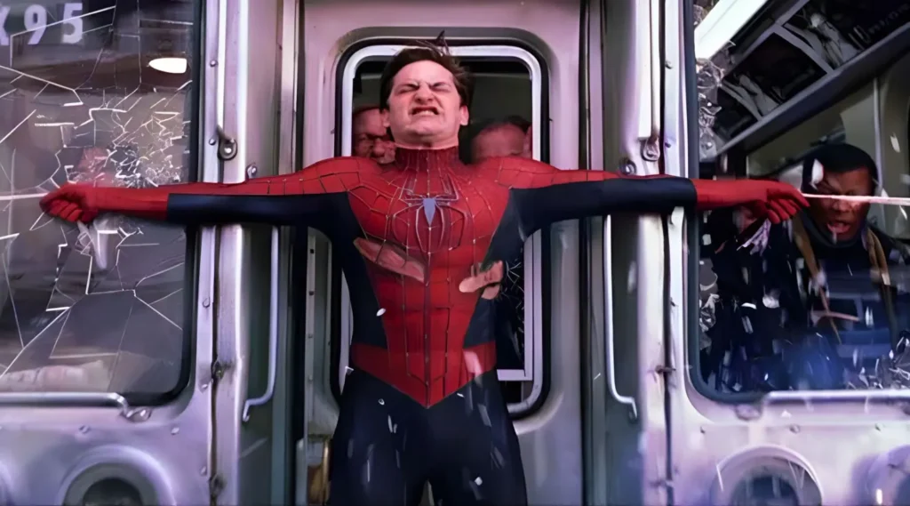 Tobey Maguire Spider-Man 2 train scene stopping runaway train iconic responsibility moment 2004