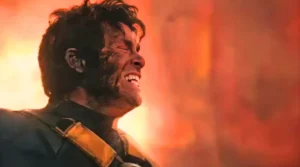 Cyclops screams and removes visor unleashing optic blast in Avengers Doomsday trailer with burning X-Mansion and Sentinel behind him