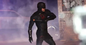 Charlie Cox as Daredevil in black suit with DD emblem in Born Again Season 2 on Disney Plus
