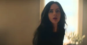 Krysten Ritter As Jessica Jones In A Dimly Lit Room In Daredevil Born Again Season 2